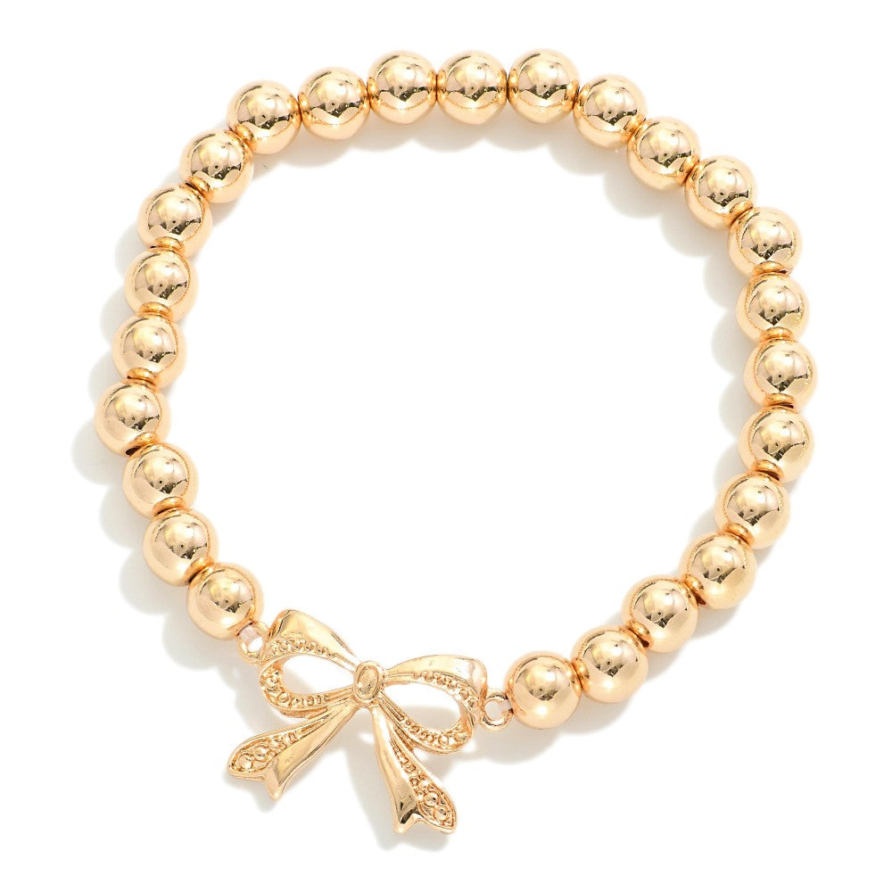 Metal Tone Beaded Stretch Bracelets With Bow Charm - Gold