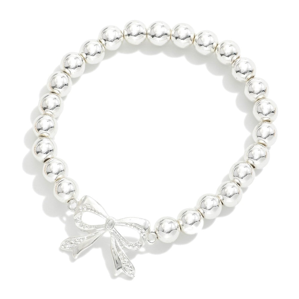 Metal Tone Beaded Stretch Bracelets With Bow Charm - Silver