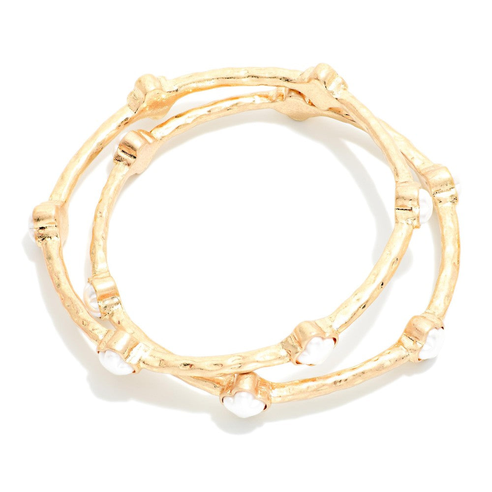 Set Of Two Hammered Metal Tone Bangle Bracelet Featuring Glitter Resin Clover - Pearl