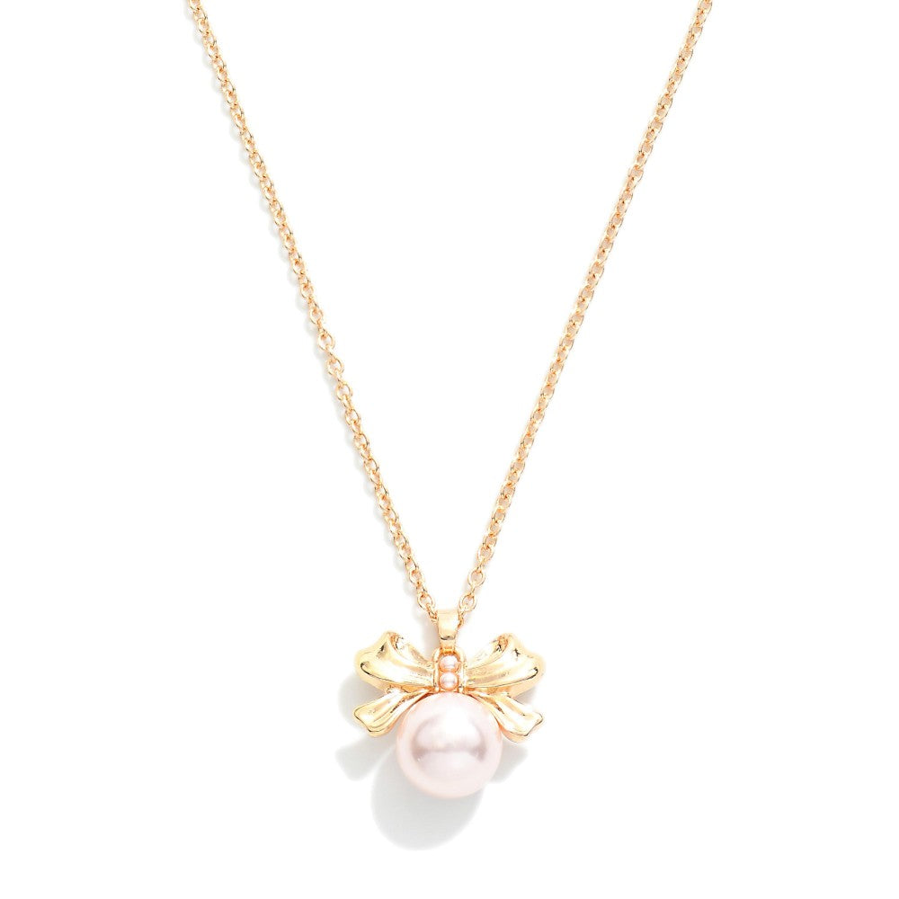 Chain Link Necklace Featuring Pearl and Bow Pendant - Gold