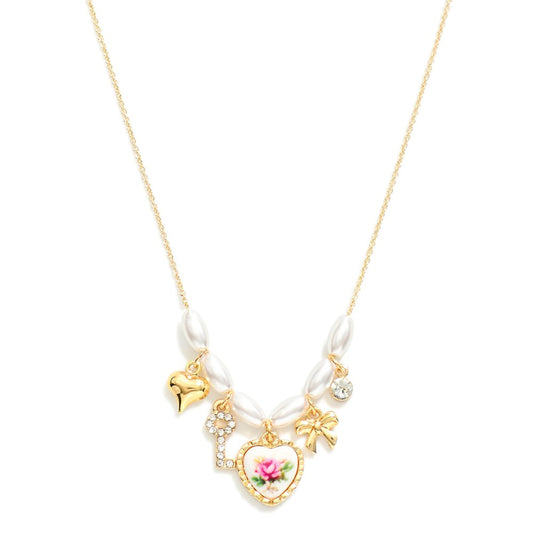 Dainty Gold Tone Chain Link Necklace With Pearl Beads Featuring Gold Tone Heart, Bow, Key, Rhinestone, & Vintage Porcelain Pink Rose Heart Charm