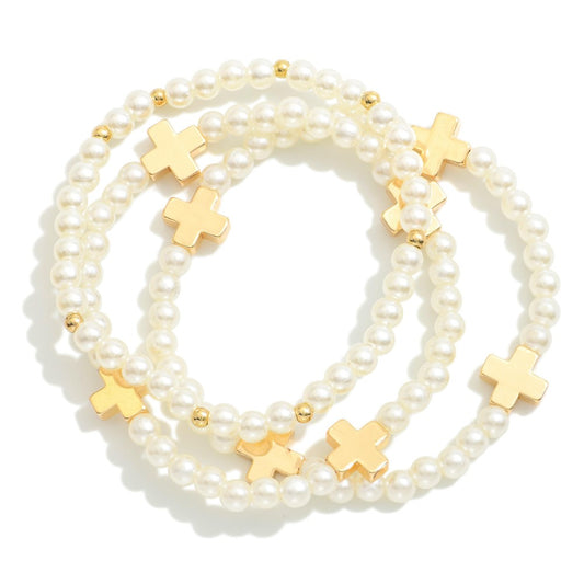Set Of Three Metal Tone Beaded Stretch Bracelets Featuring Pearls & Plus Crosses