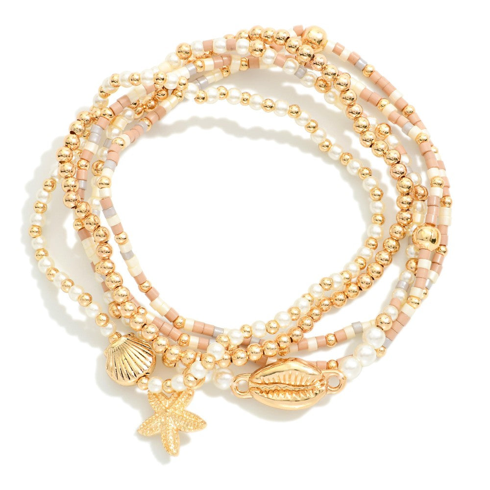Set Of Five Beaded Stretch Bracelets Featuring Pearls, Seed Beads, & Metal Tone Sea Animal Charms -Brown