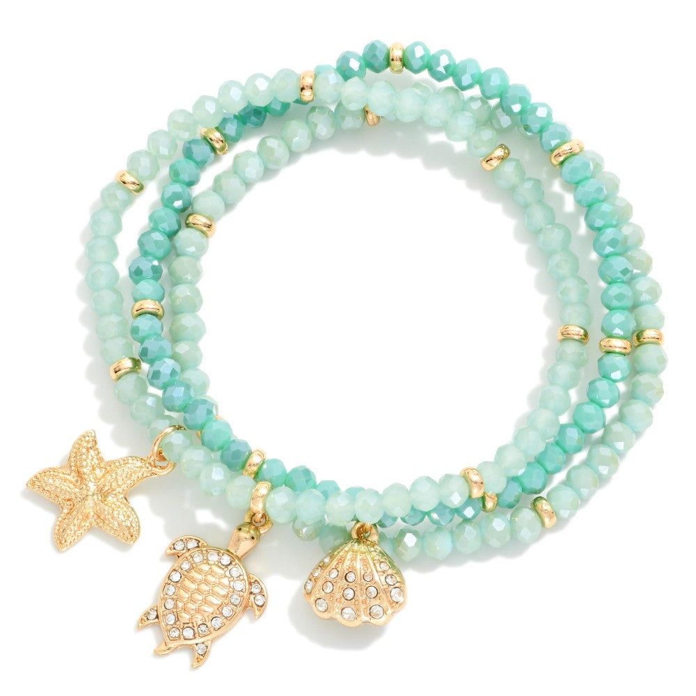 Set Of Three Faceted Bead Stretch Bracelets Featuring Metal Tones, & Beach Charms - Mint
