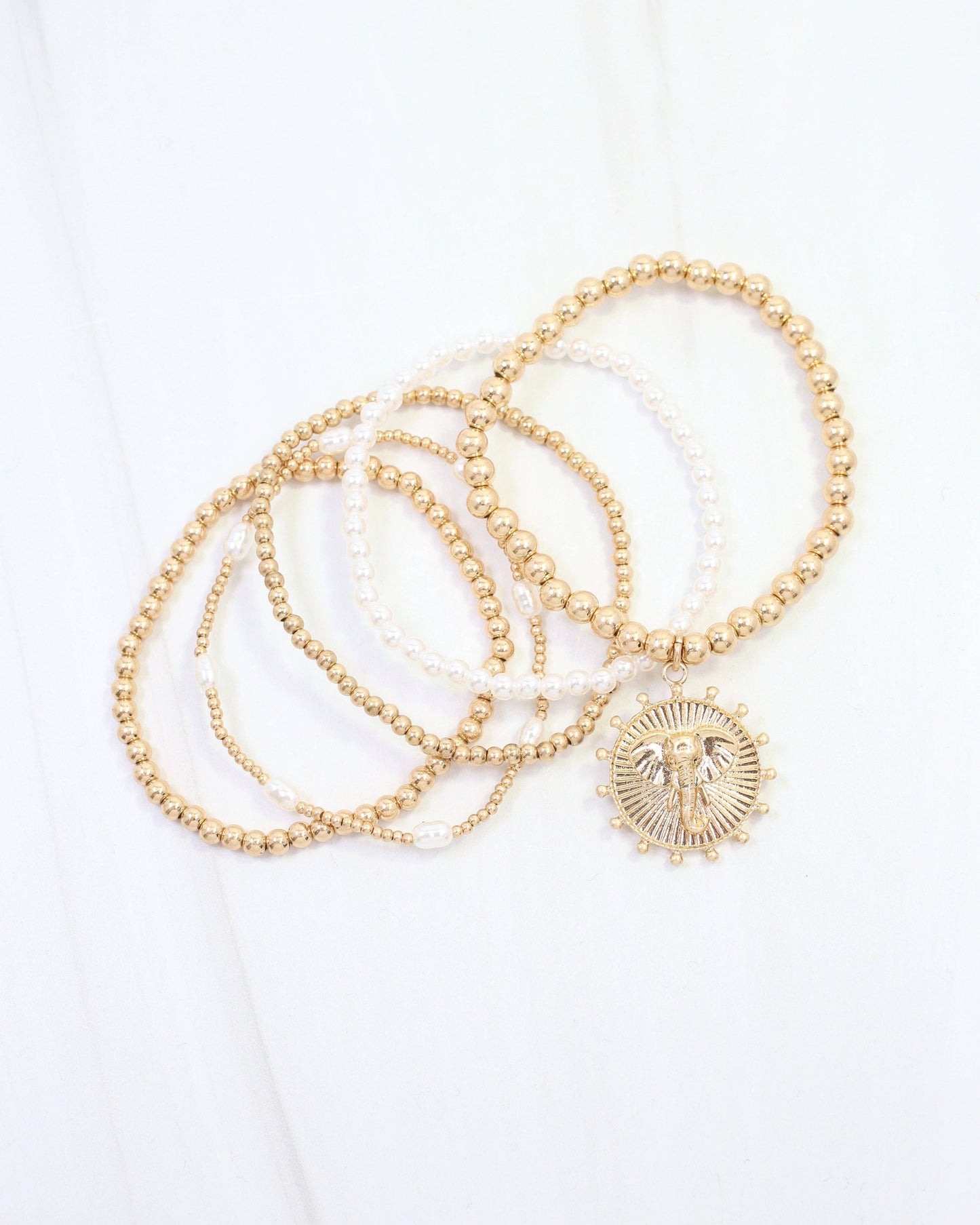 Caroline Hill Carmen Coin Beaded Bracelet Set Worn Gold Elephant